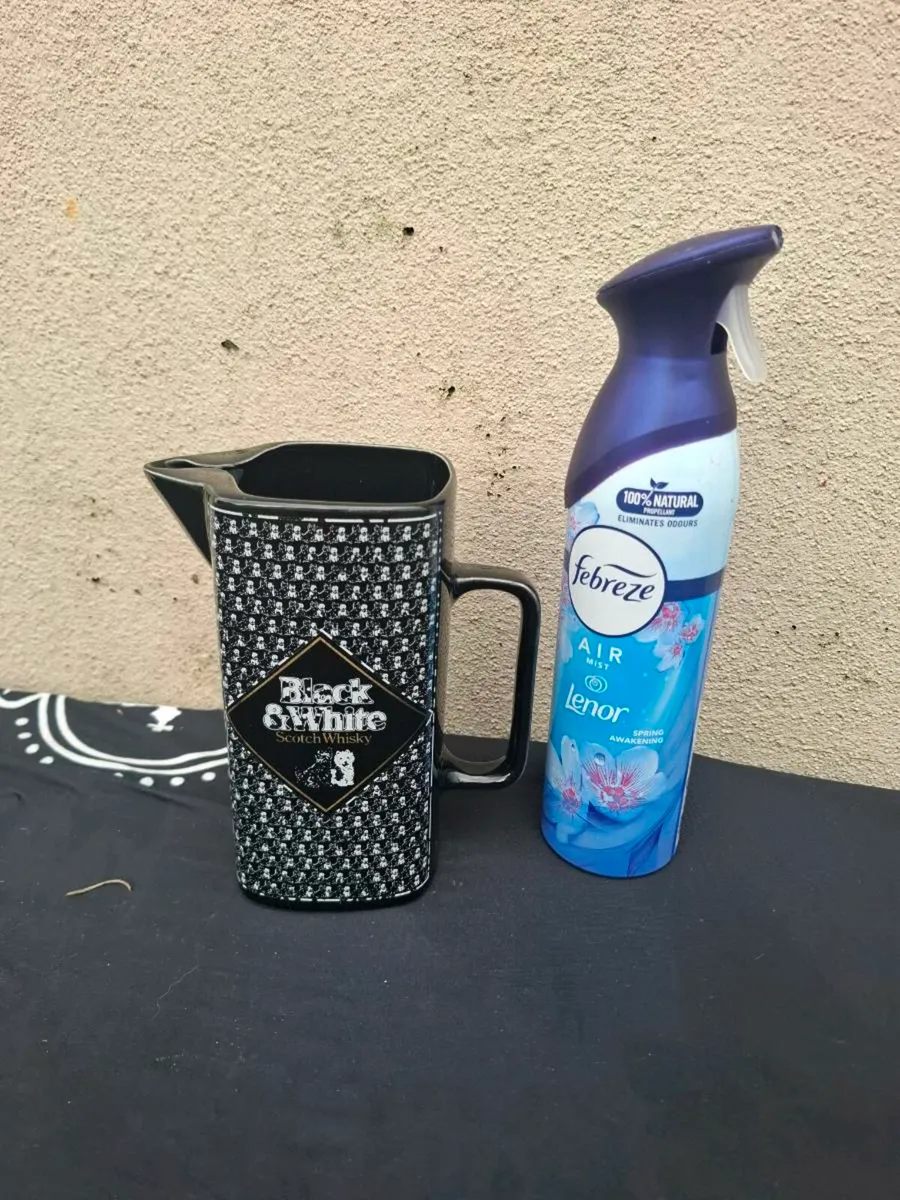 Black and white whiskey pitcher postage possible
