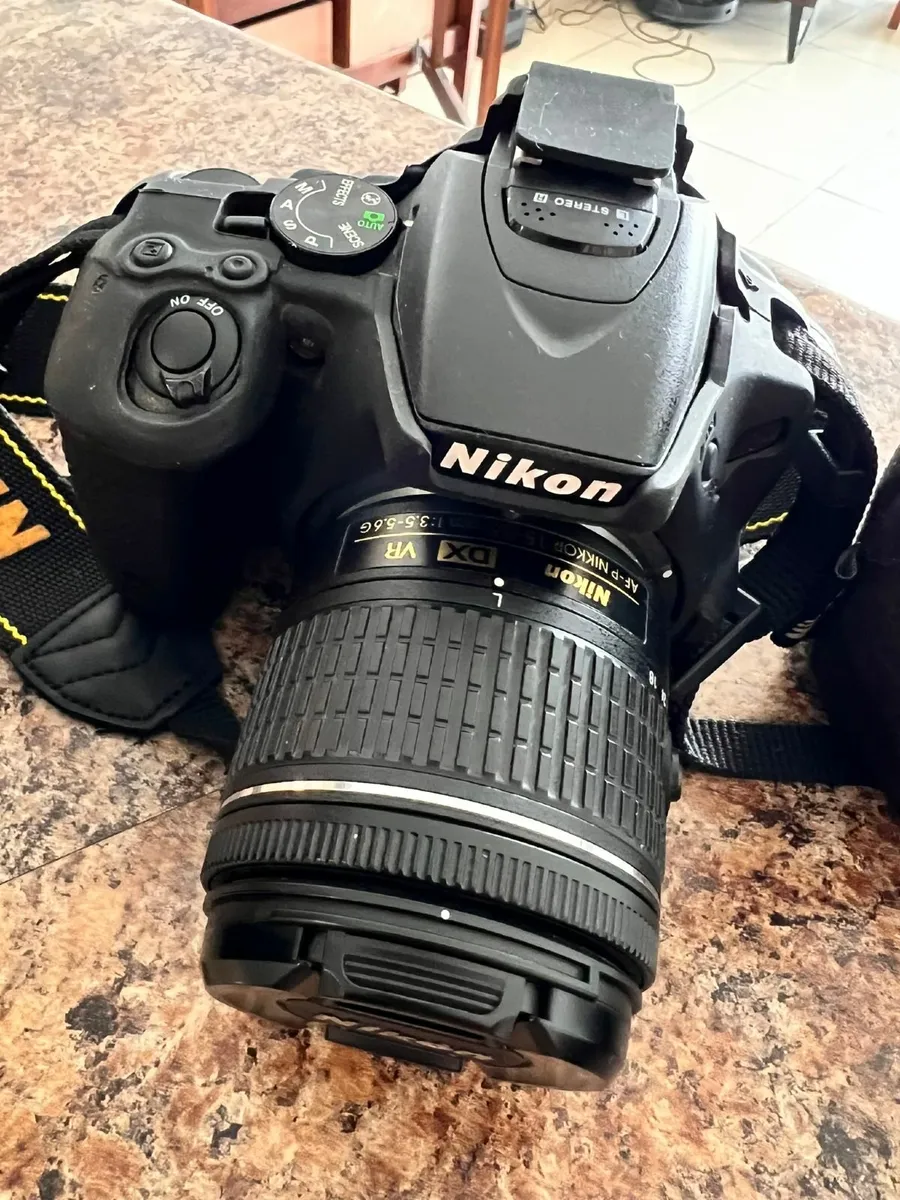 Nikon D5600 with 18-55mm and 35mm lenses + battery - Image 2