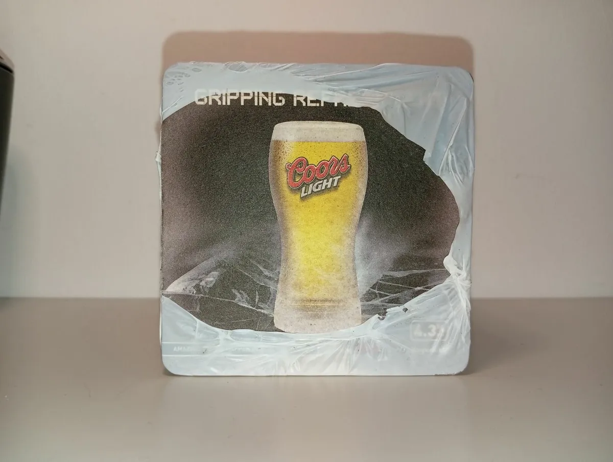 Coors Light Gripping Refreshment unopened beer mat - Image 1
