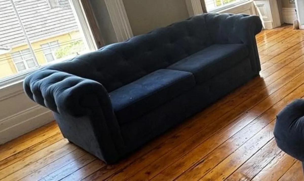 Two blue 3 seater chesterfield stye sofas - Image 1