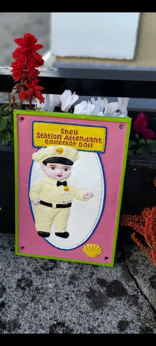 Shell cast iron sign