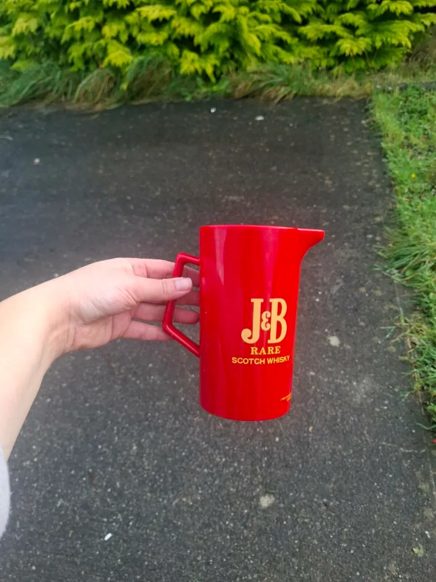 Plastic red JB whiskey jug postage possible
