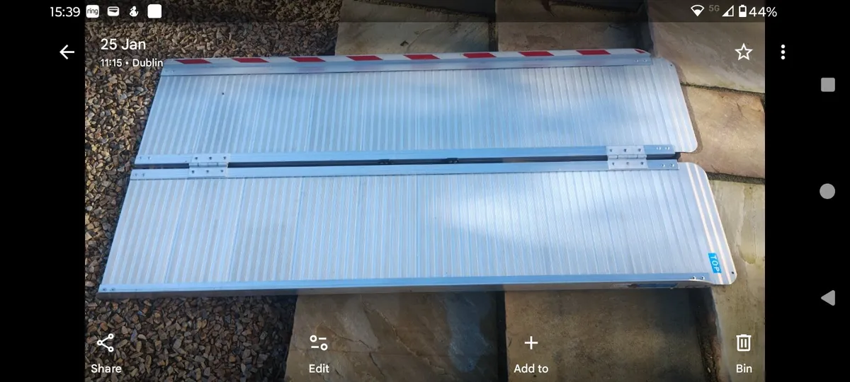 Foldable wheelchair ramp