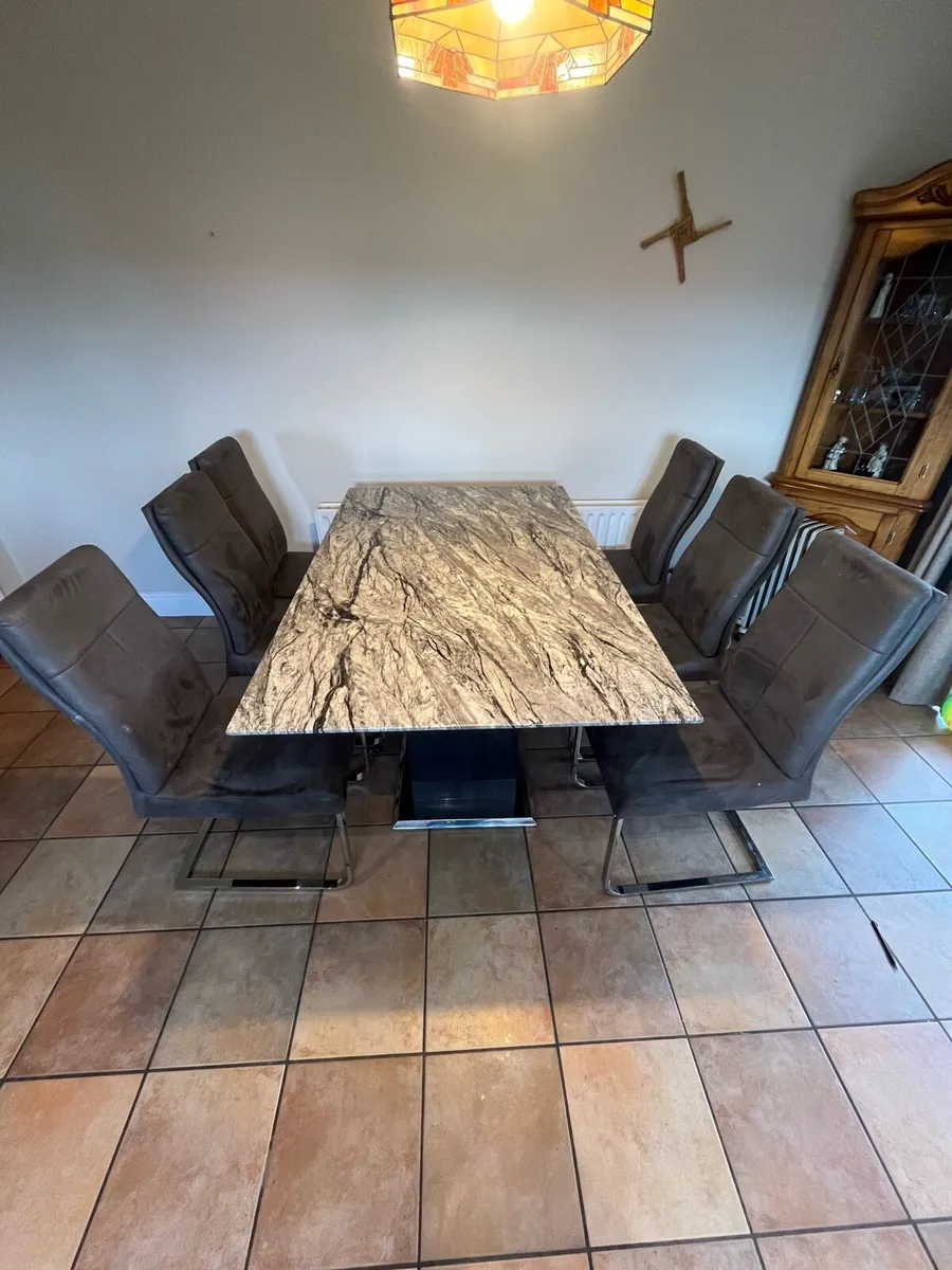 Granite dining room table and chairs - Image 1