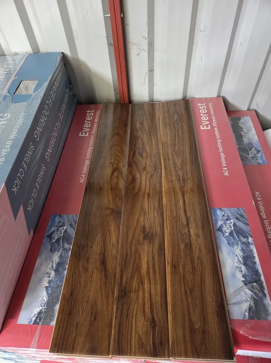 Brand New 12MM High Gloss Flooring - Image 1