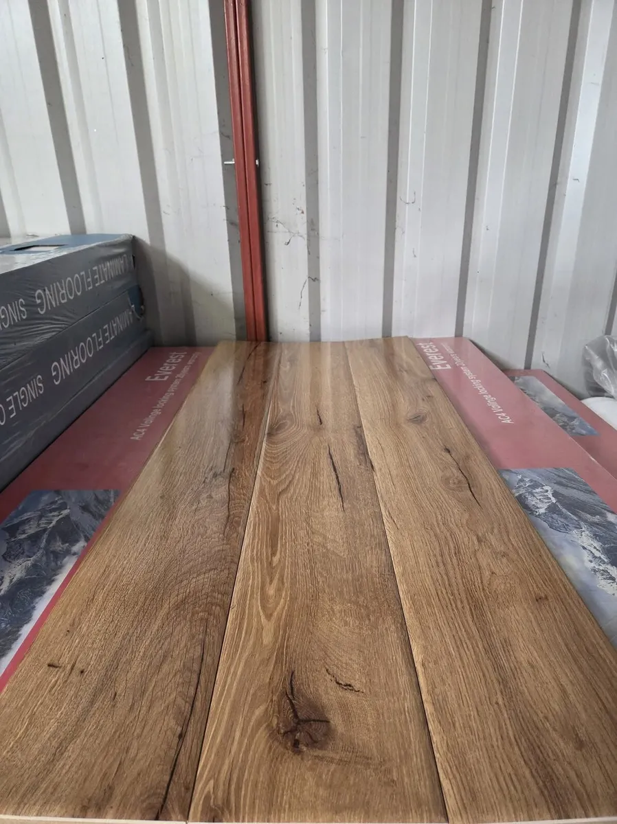 Brand New 12MM High Gloss Flooring - Image 3