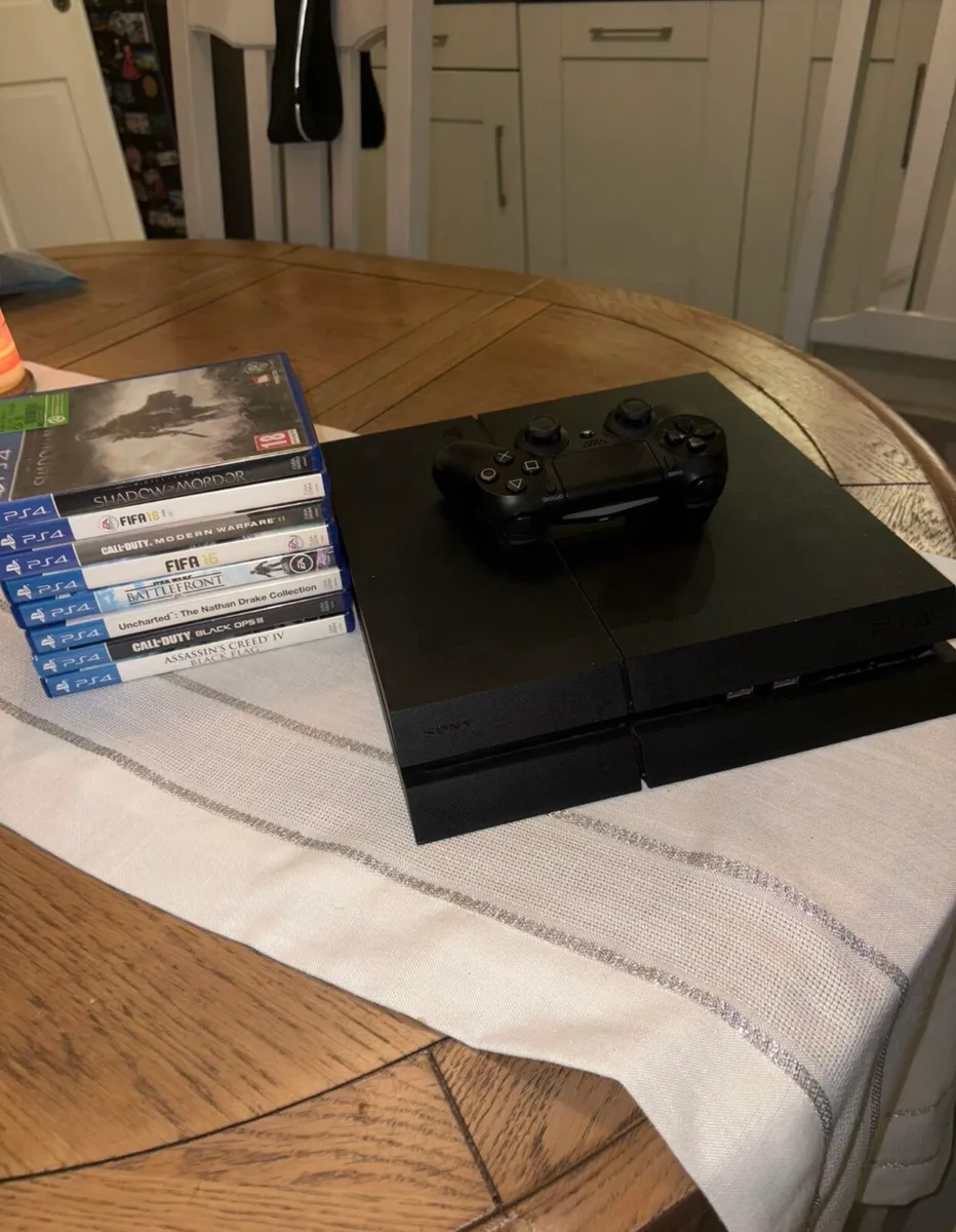PlayStation 4 (PS4) Bundle + 8 Games - Image 1