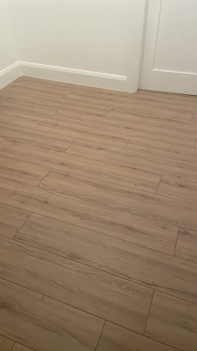 12mm AC5 Laminate flooring and 5kg walnut grout - Image 1