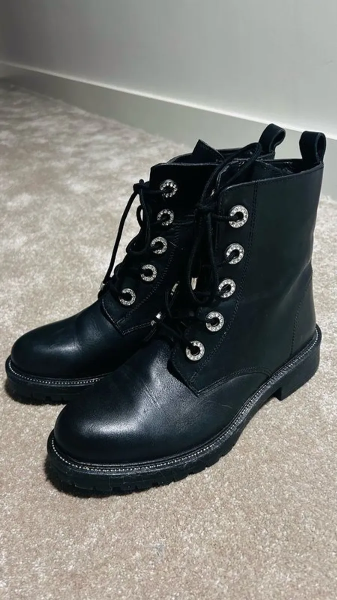 Elegant and Descriptive Boots - Image 1