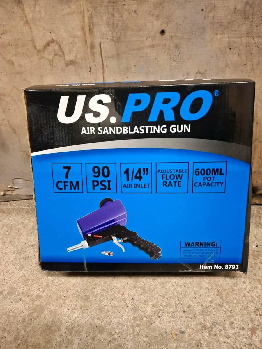 Sand blaster gun and bag of sand - Image 1