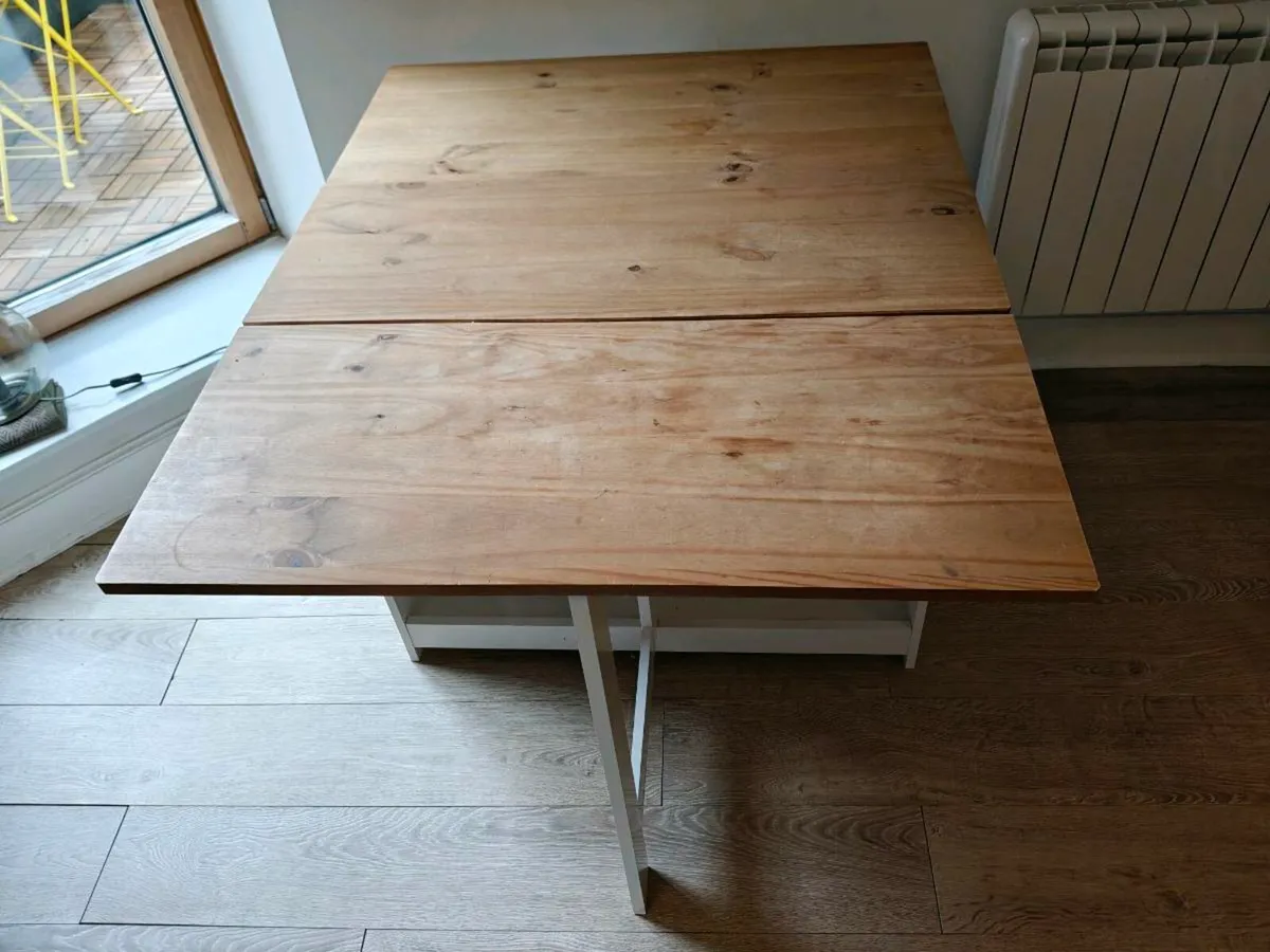 IKEA foldable dining table with 4 chairs - Image 1