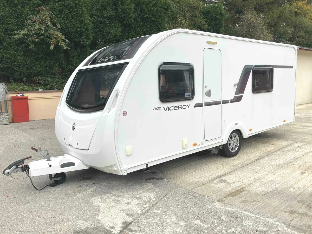 Swift viceroy fixed bed caravan with motor movers - Image 1