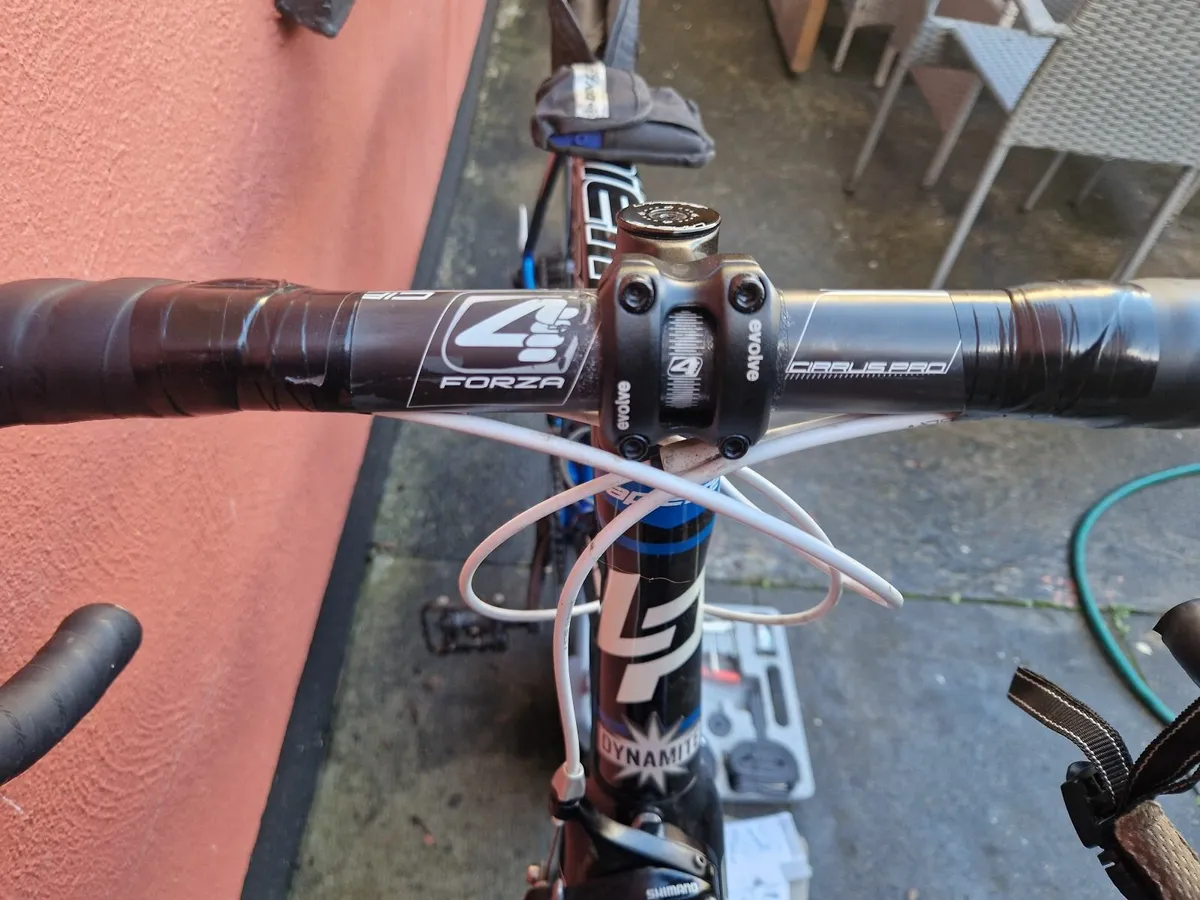 Lapierrie Road bike and accessories. - Image 4