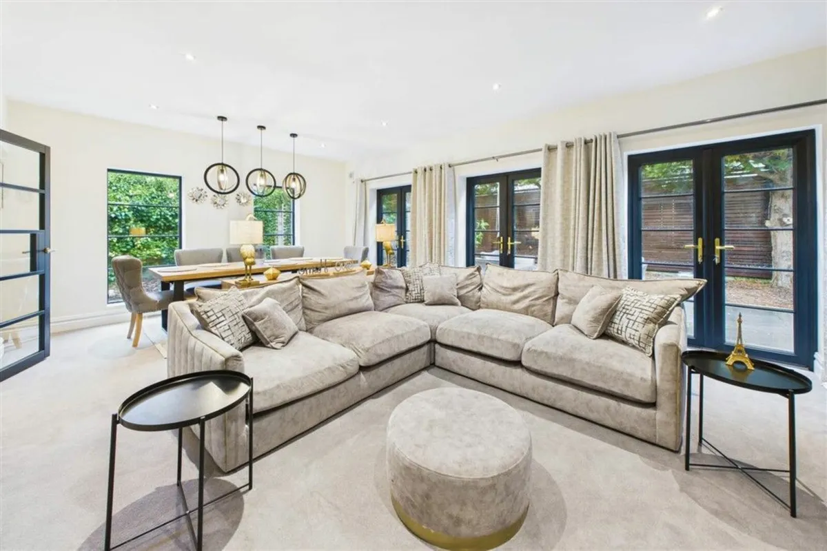 Zola Corner couch  & Round silver Foot stool - Image 1