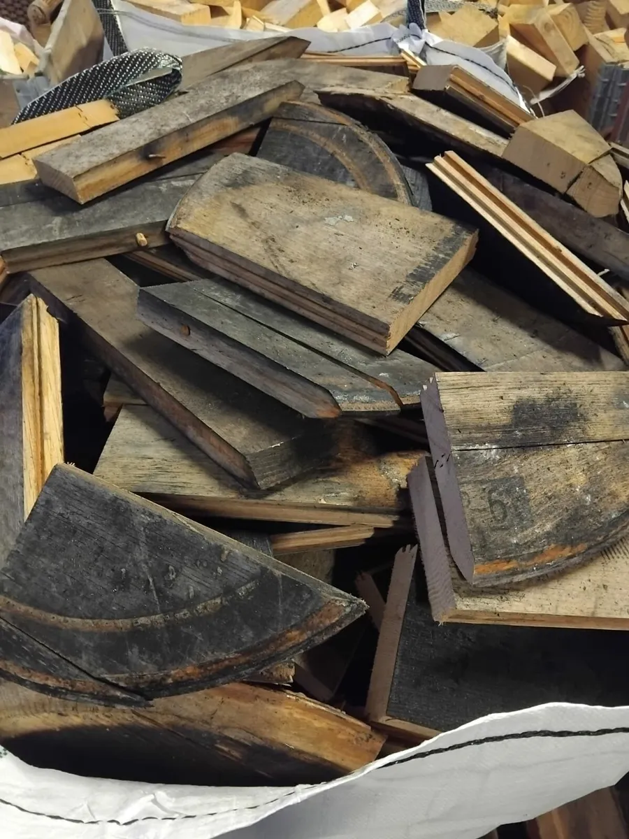 Bulk bags of seasoned oak firewood. - Image 1