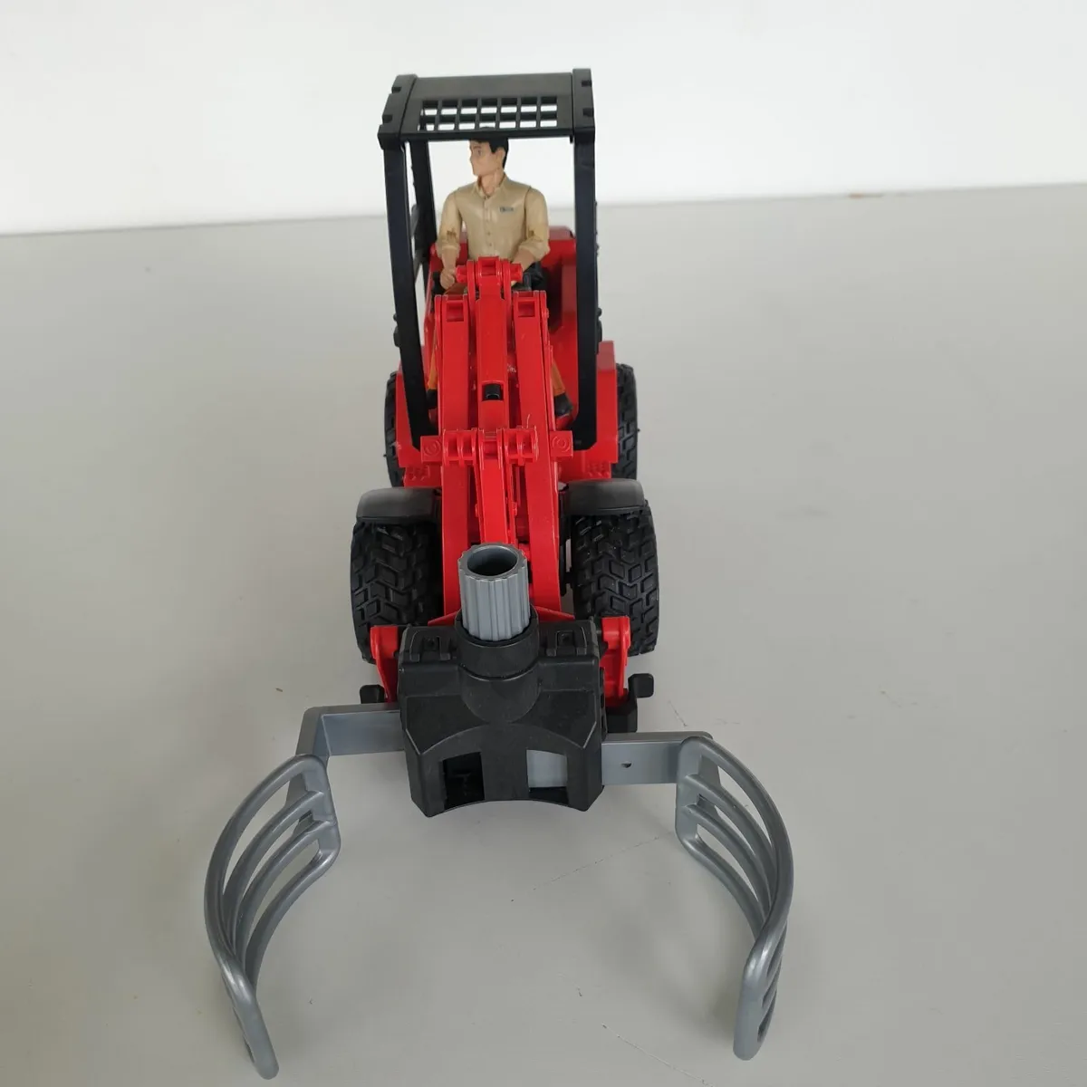 Bruder schaffer loader with driver & bale - Image 3