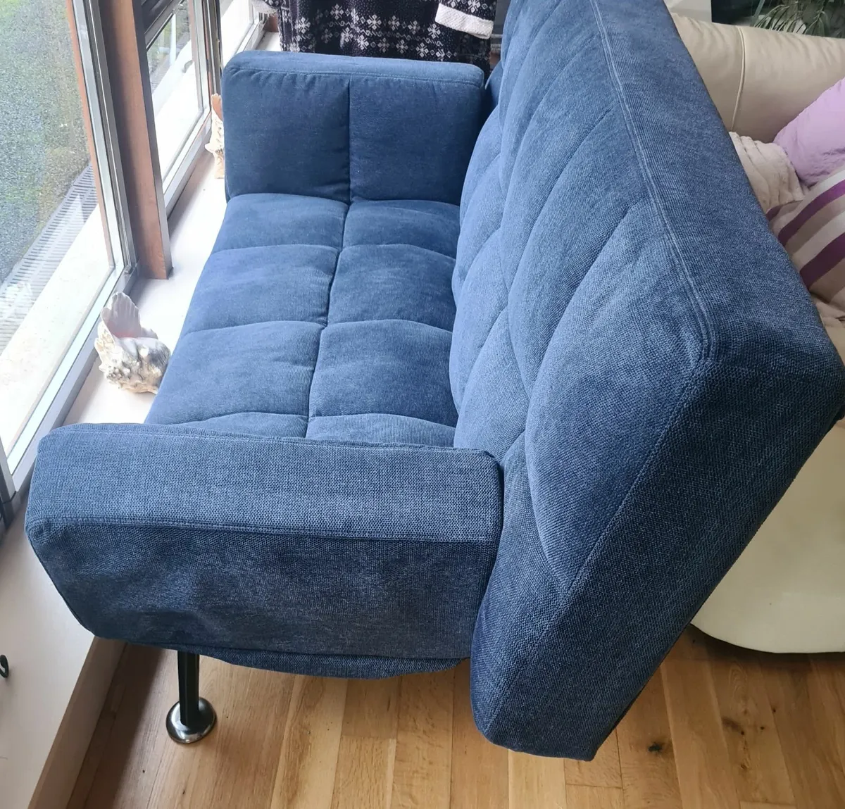 Couch/bed setee Blue in colour - Image 1