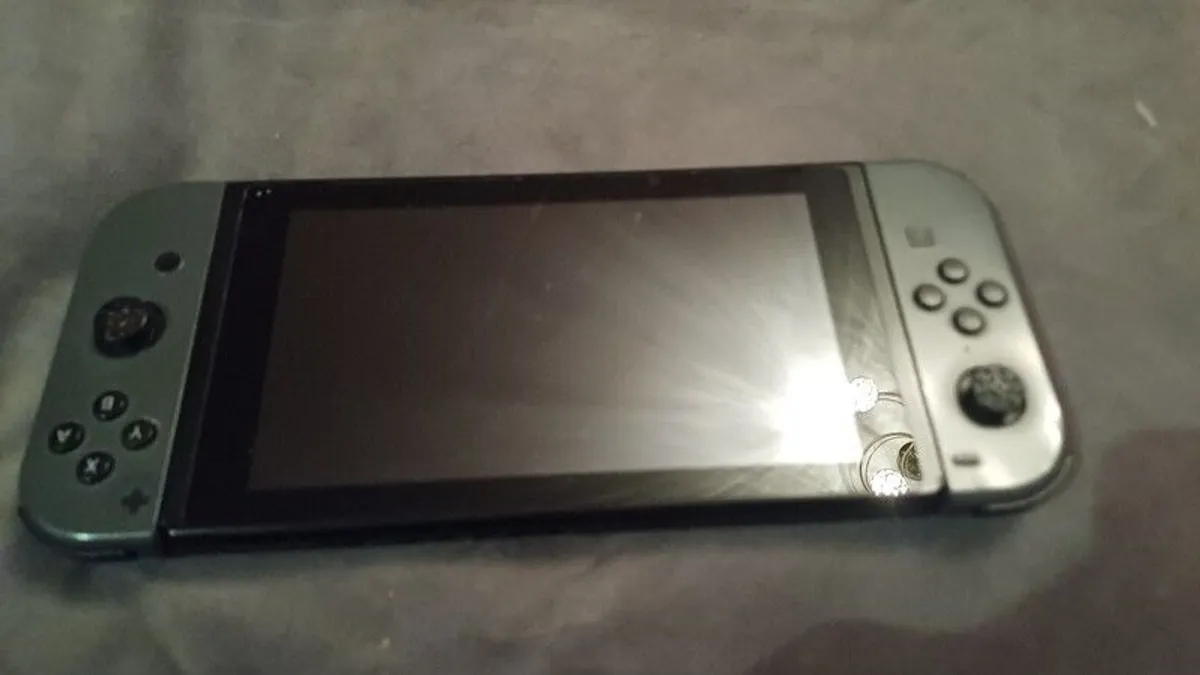 nendido switch grey 32 gb plus hello neighbour - Image 2