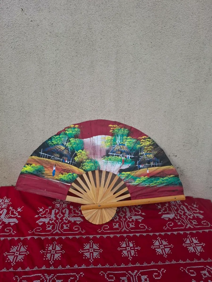 Red painted fan postage possible