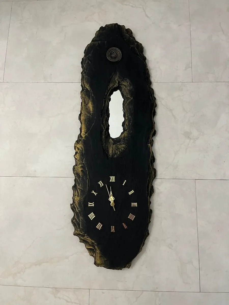 Handmade slate clock with mirror.