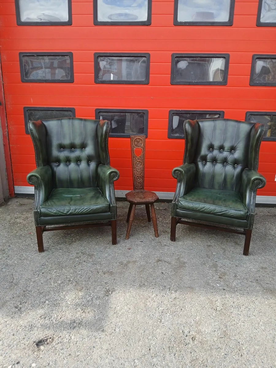 old pair of chesterfeild arm chairs