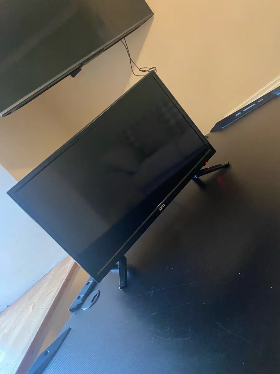 Monitor and desk - Image 1