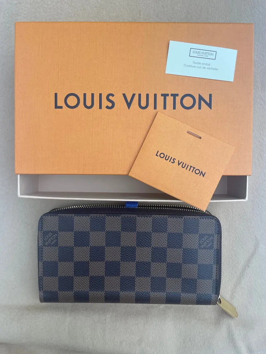 Louis Vuitton Damier Ebene Brown Zippy Wallet - Image 1