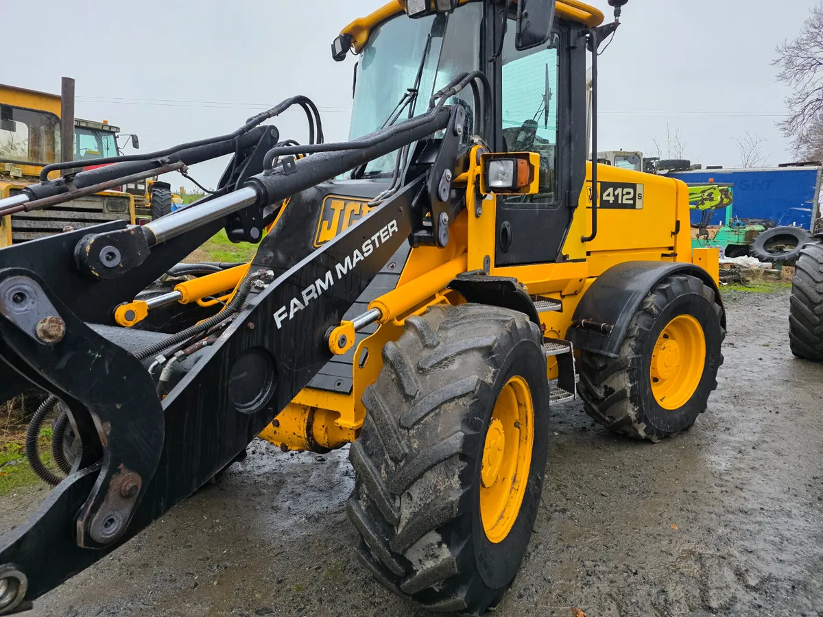 2.   jcb 412 - Image 1