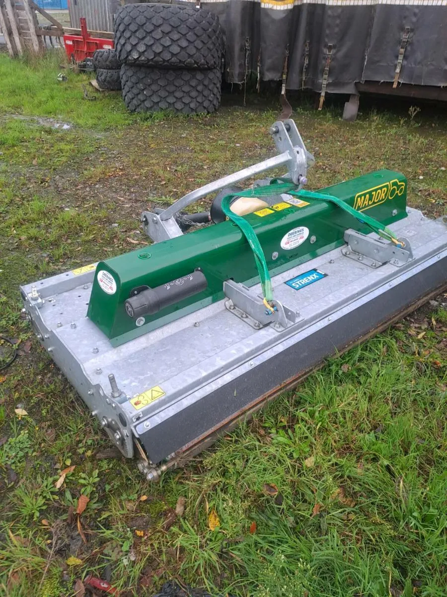 Major mower mulching. - Image 3