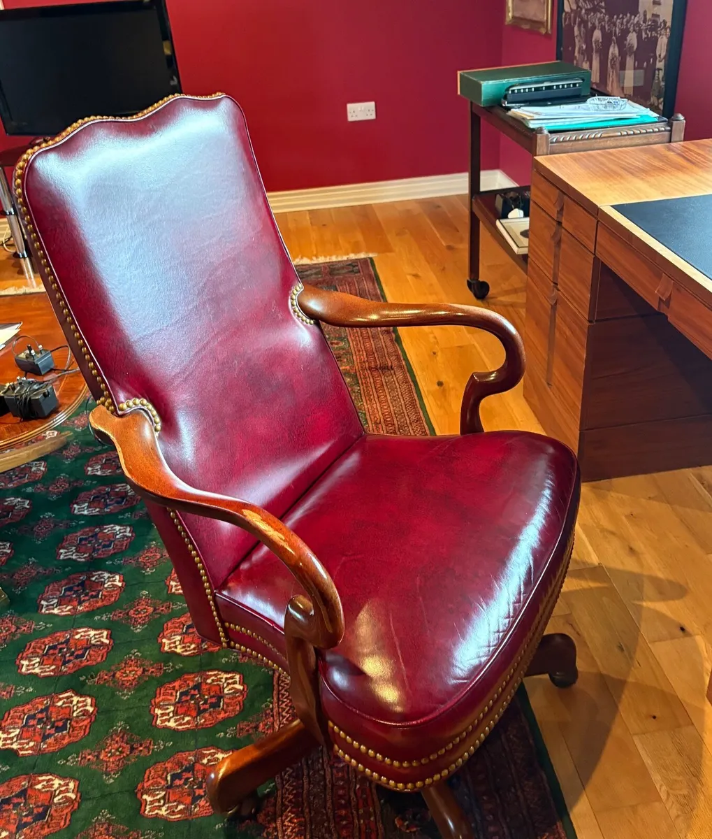 Real leather swivel/tilt  chair.