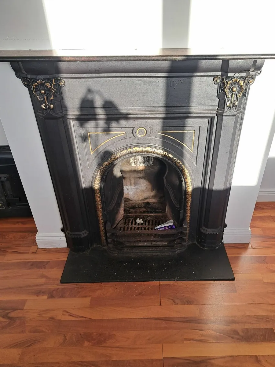 Cast iron fire surround