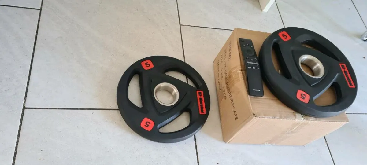 Brand new 4x5kilo Olympic weight plates - Image 1
