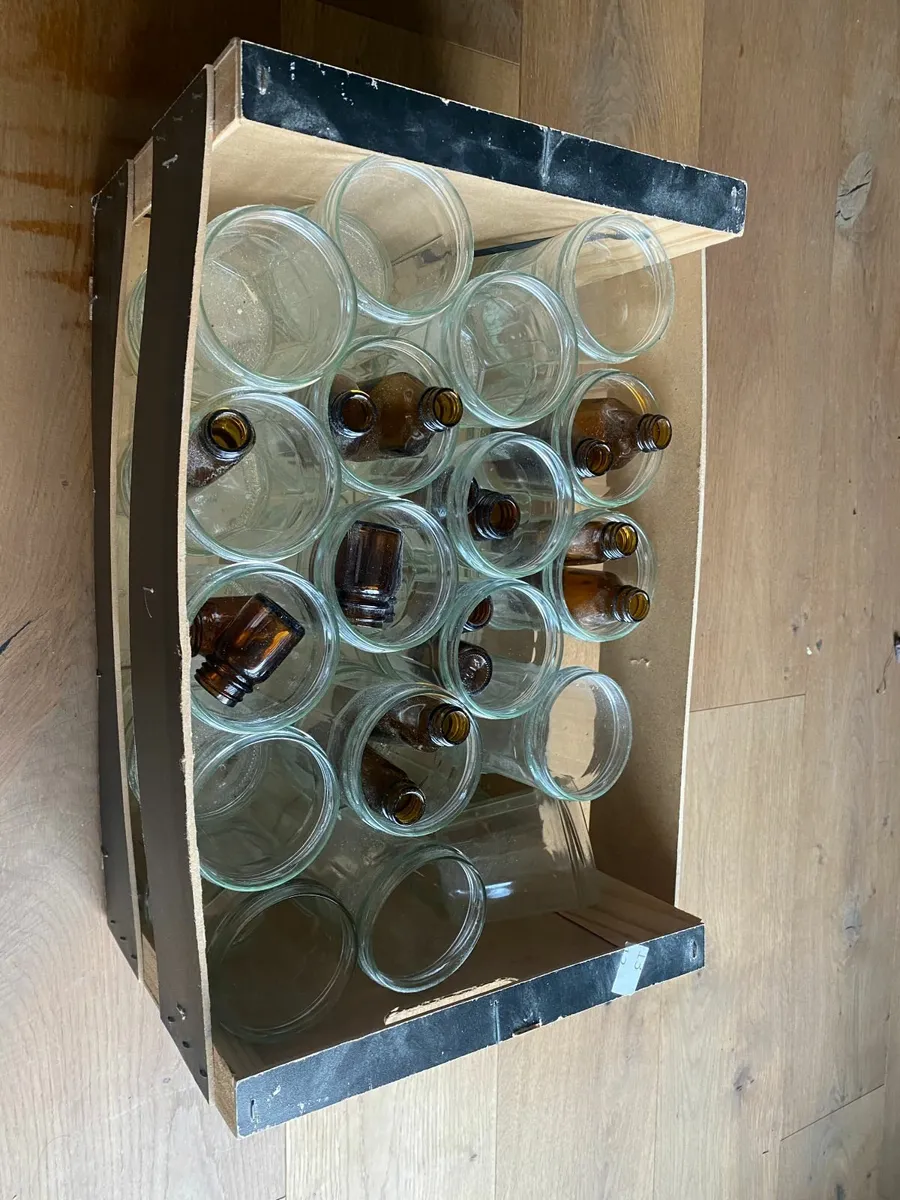 Glass jam jars and medicine bottles - Image 1
