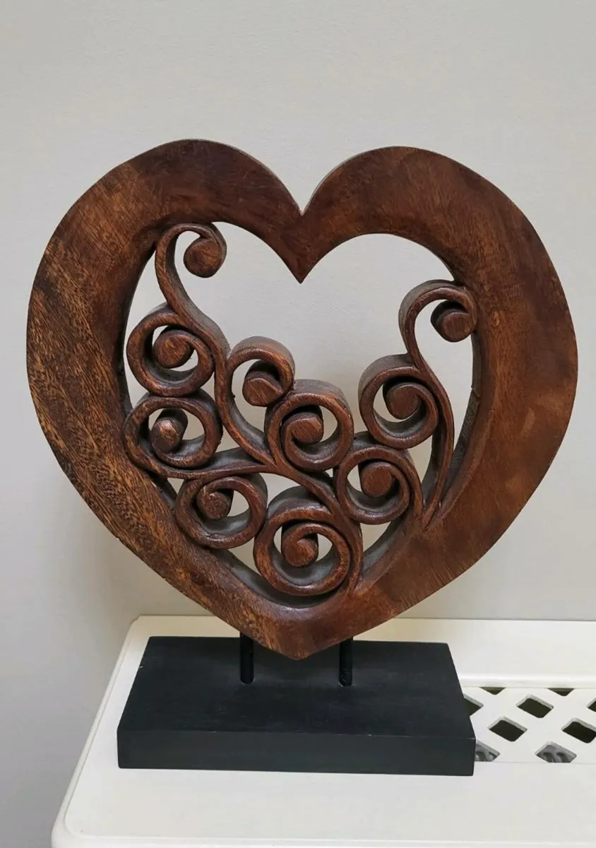 Large wooden carved heart sculpture
