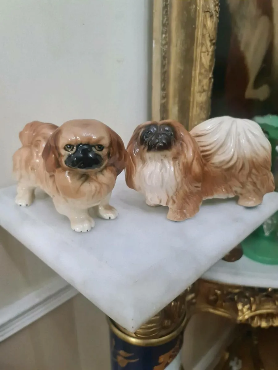 A pair of beswick peckinese - Image 1