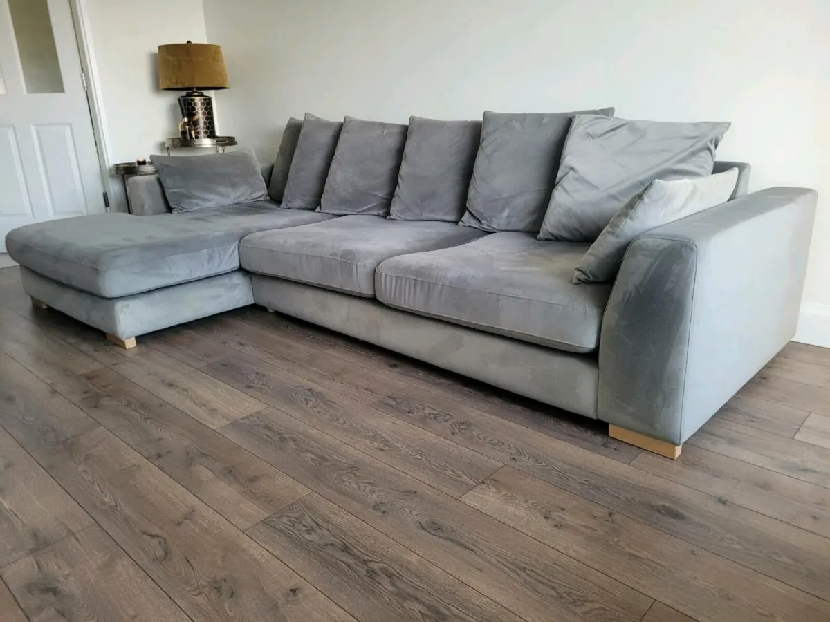 Large L shaped couch with extra footstool - Image 1