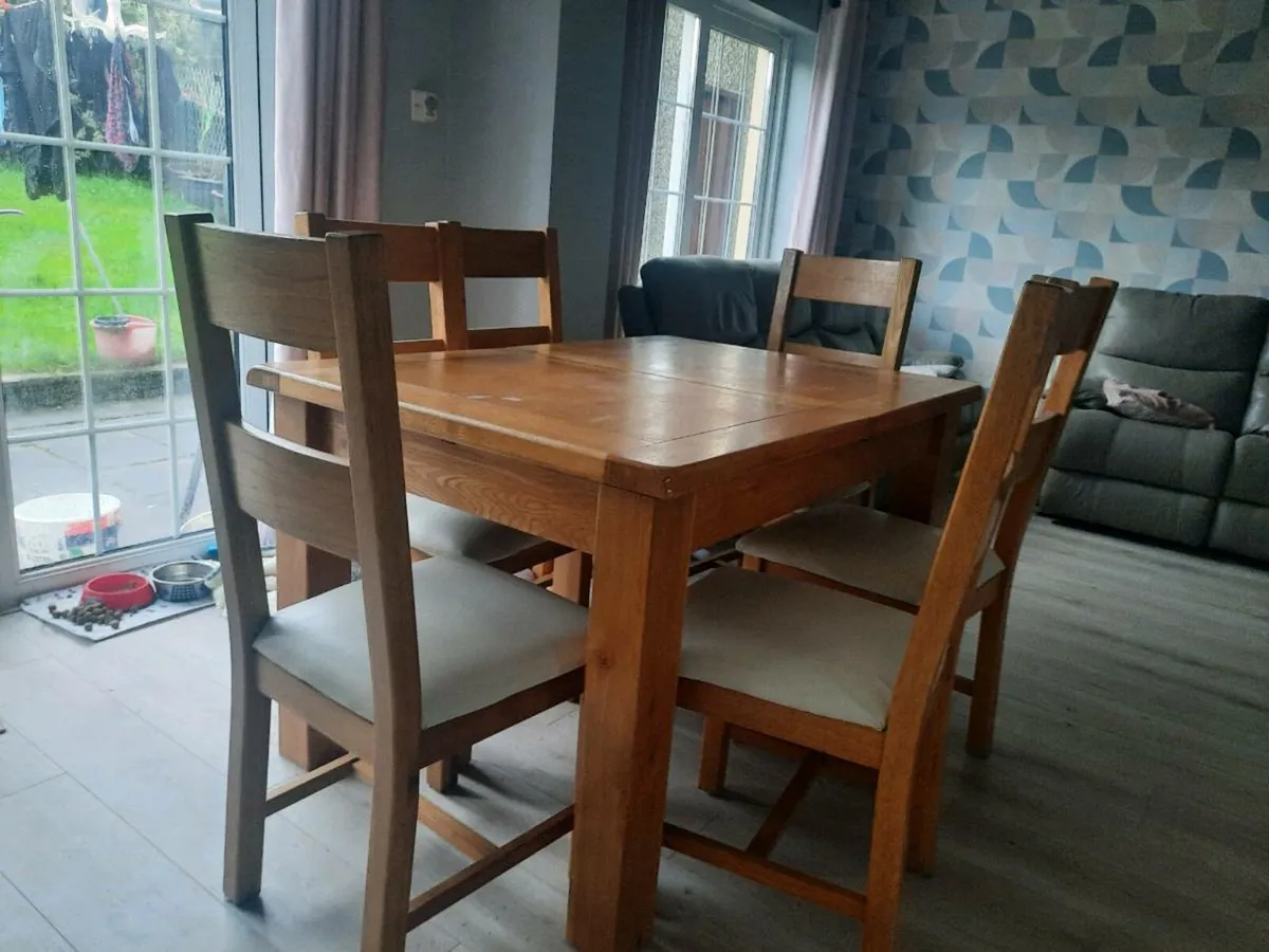 Dinning table and 6 chairs - Image 1