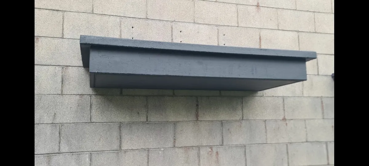 Overhead door canopies - Image 1