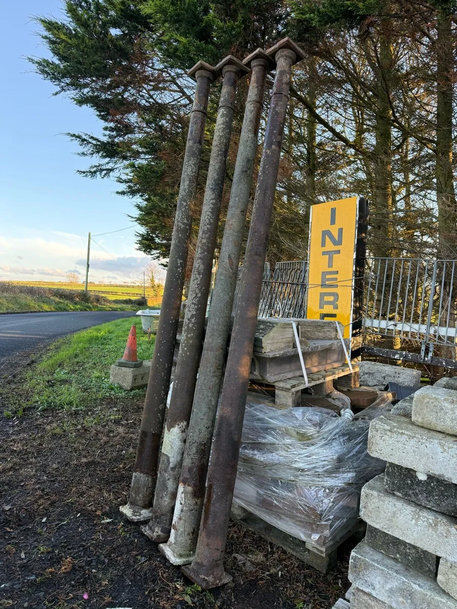 Four matching  antique Cast Iron Posts. Nine feet. - Image 1