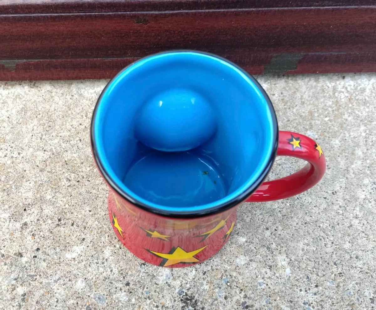 Red mug & a glued together cup & saucer (used). - Image 2