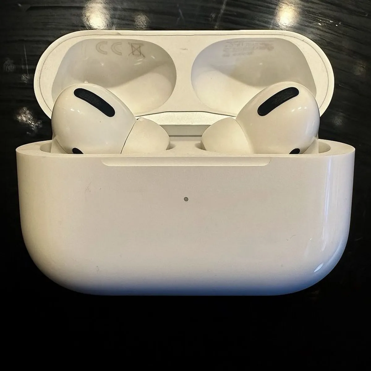 Apple AirPods Pro (1st Gen) with Wireless Charging Case - Image 1