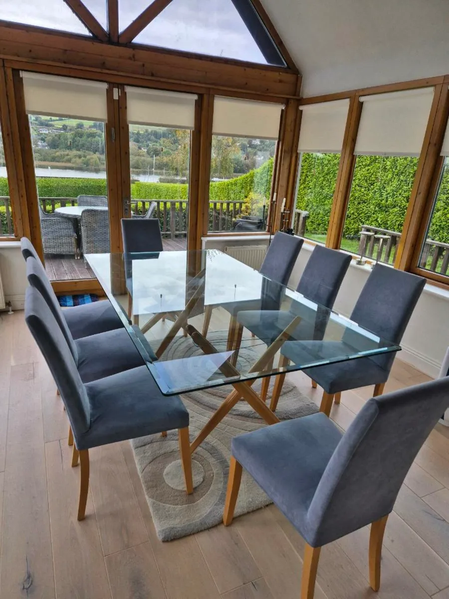 Ligne Roset Dinning Table and 8 Chairs - Image 1