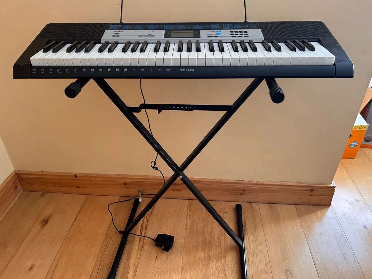 Casio LK 136 Portable Keylighting Keyboard & stand - Image 1