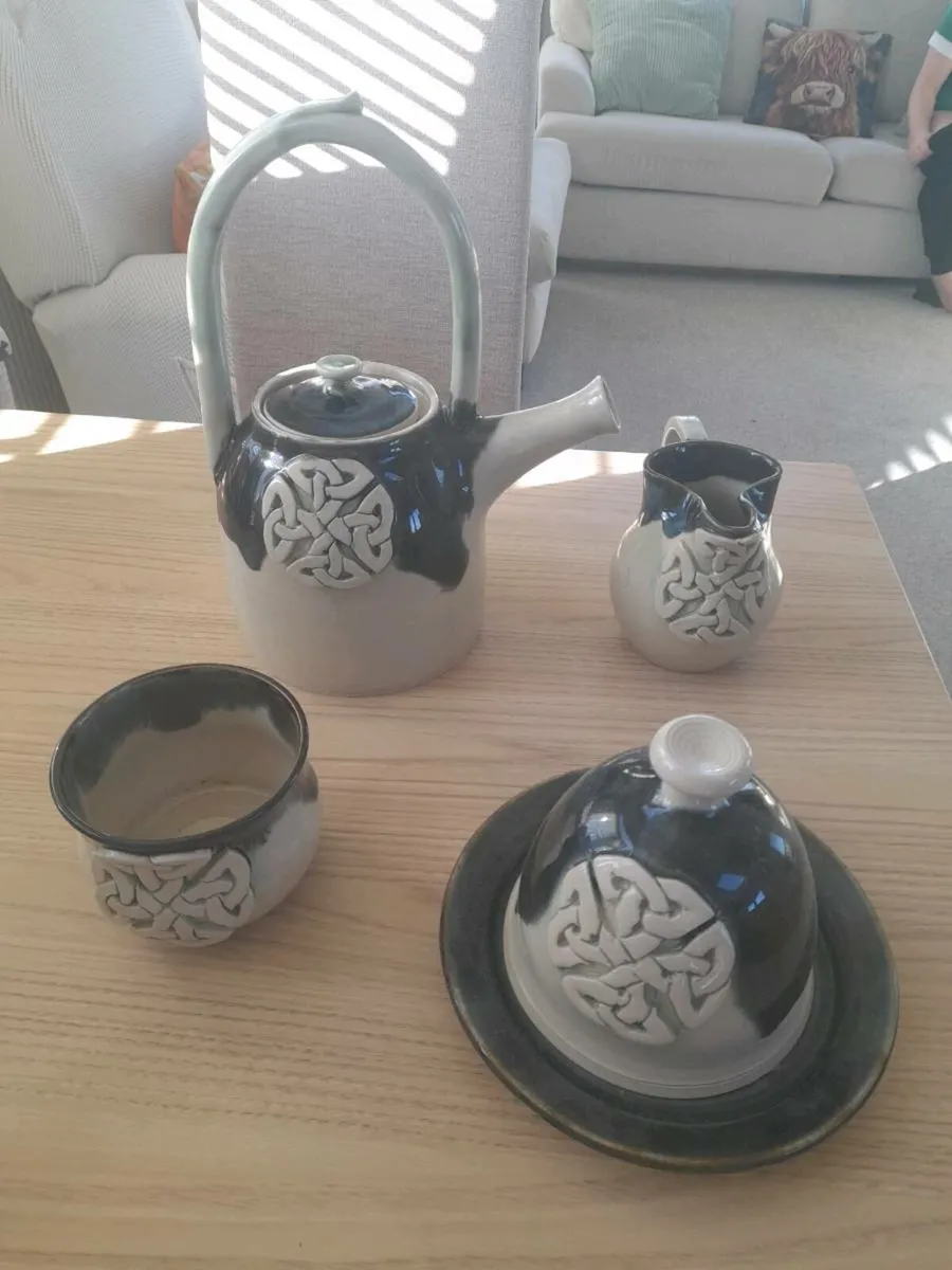 4 piece celtic design pottery set