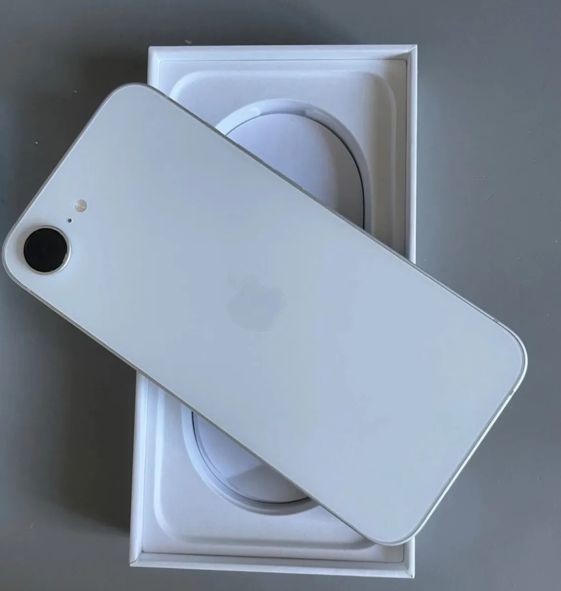 iPhone 16e - 128gb -As New - 1 week old - Image 1