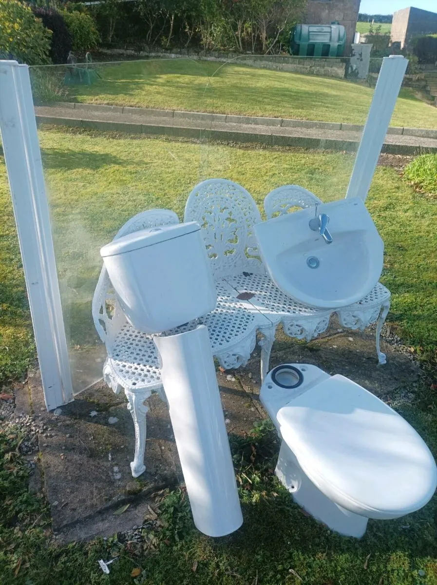 Bathroom sink toilet. Shower doors. Radiator - Image 1