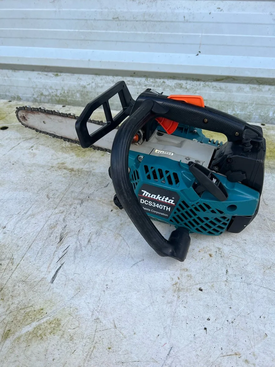 Top handle chainsaw Makita DCS34 0TH - Image 1