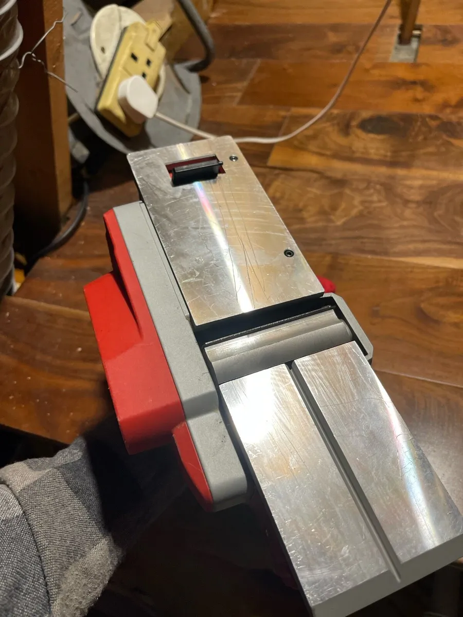 Milwaukee Planer M18 82mm + battery + dust bag - Image 2