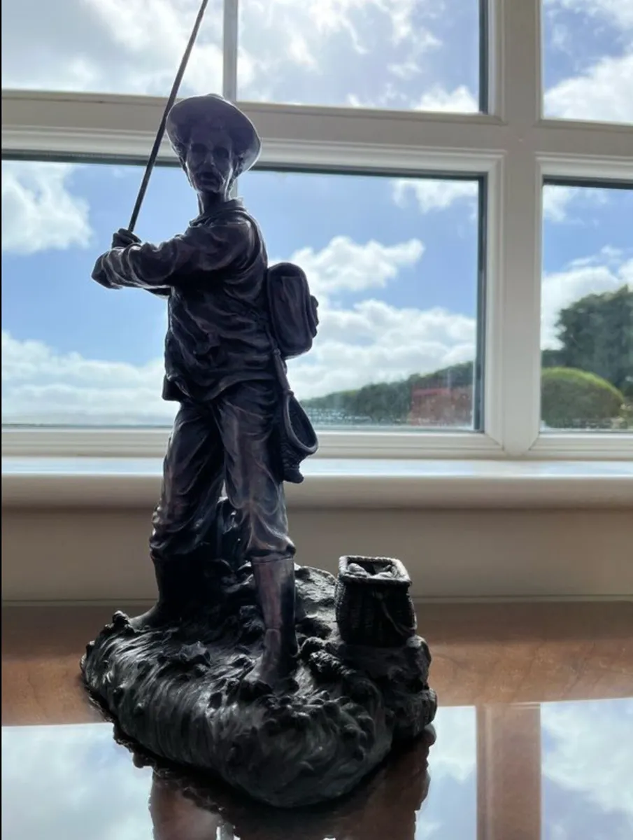 Vintage fisherman sculpture - Image 1