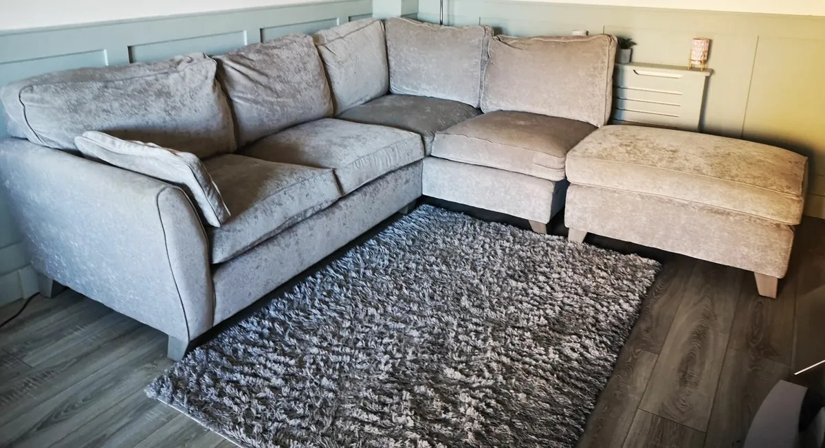 Grey / silver corner sofa with foot rest - Image 1